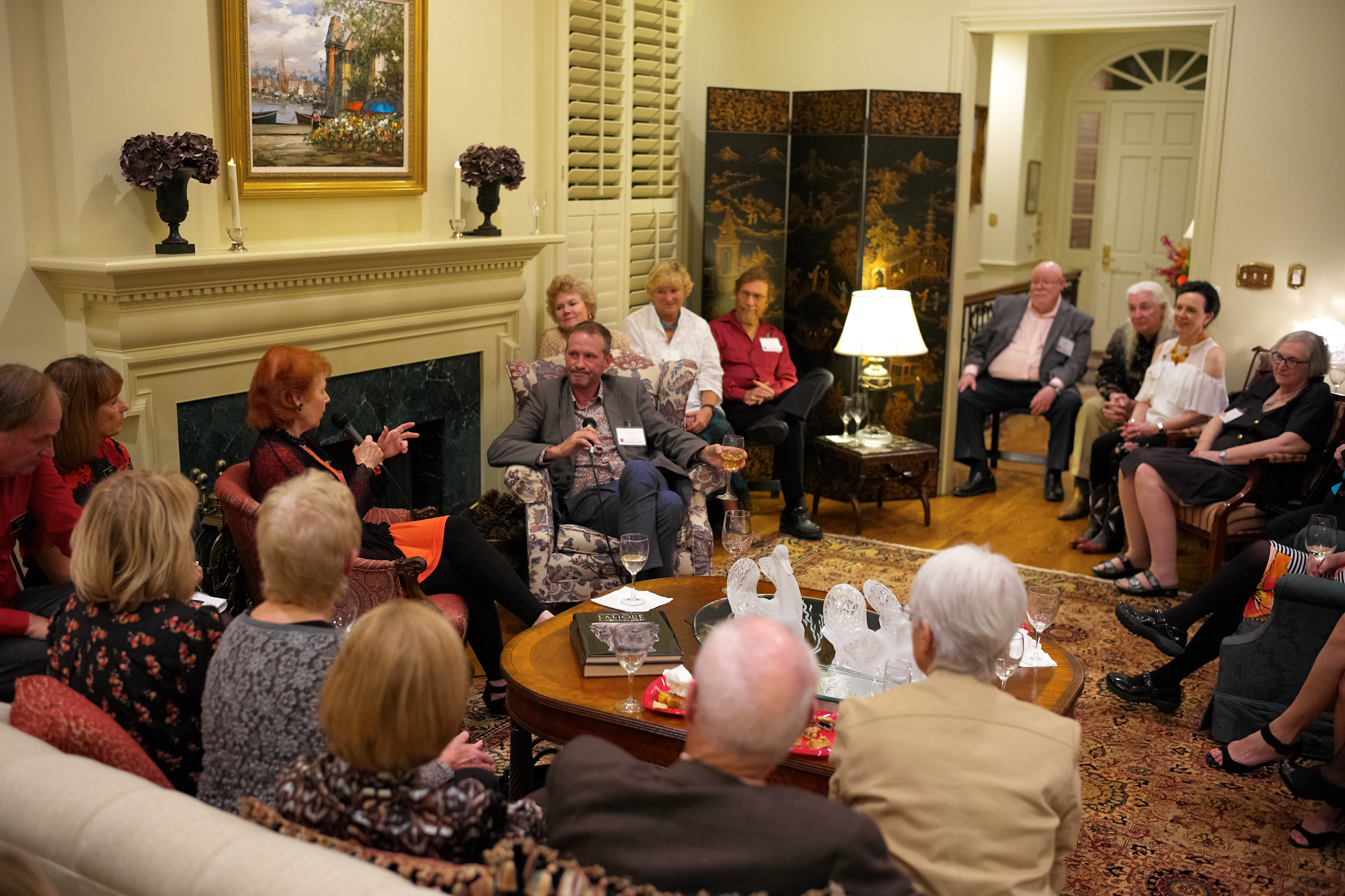 Austin Opera Guild members learn about an opera at a member's home.